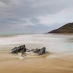 Fotograferen tussen eb en vloed aan de Opaalkust: tips en inspiratie Stenen in het water aan de Opaalkust.